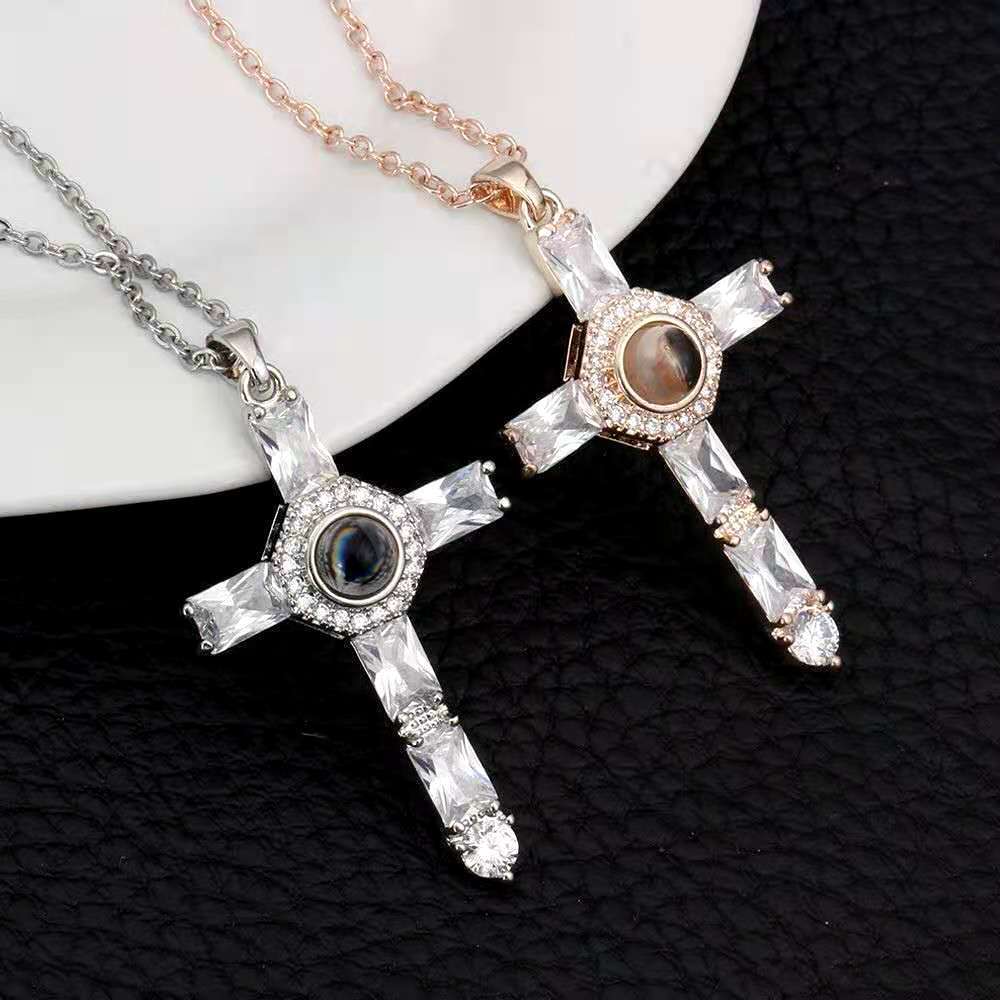 Real radiant cross projection necklaces in silver and rose-gold finishes