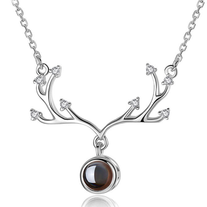 Real open antler projection necklaces in silver and rose-gold finishes