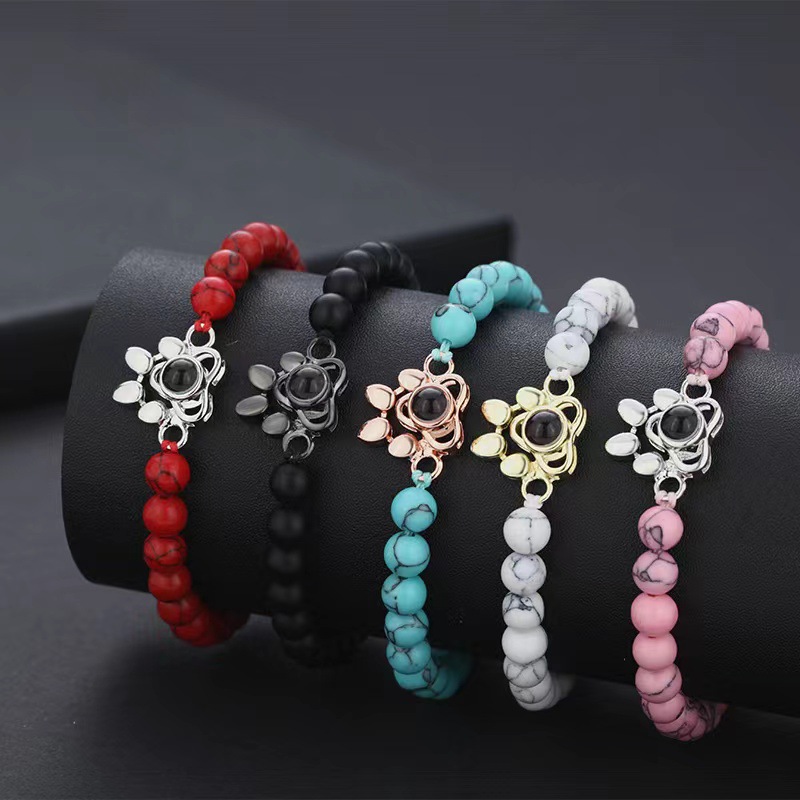 Real stone bead bracelet with a paw-shaped projection centerpiece