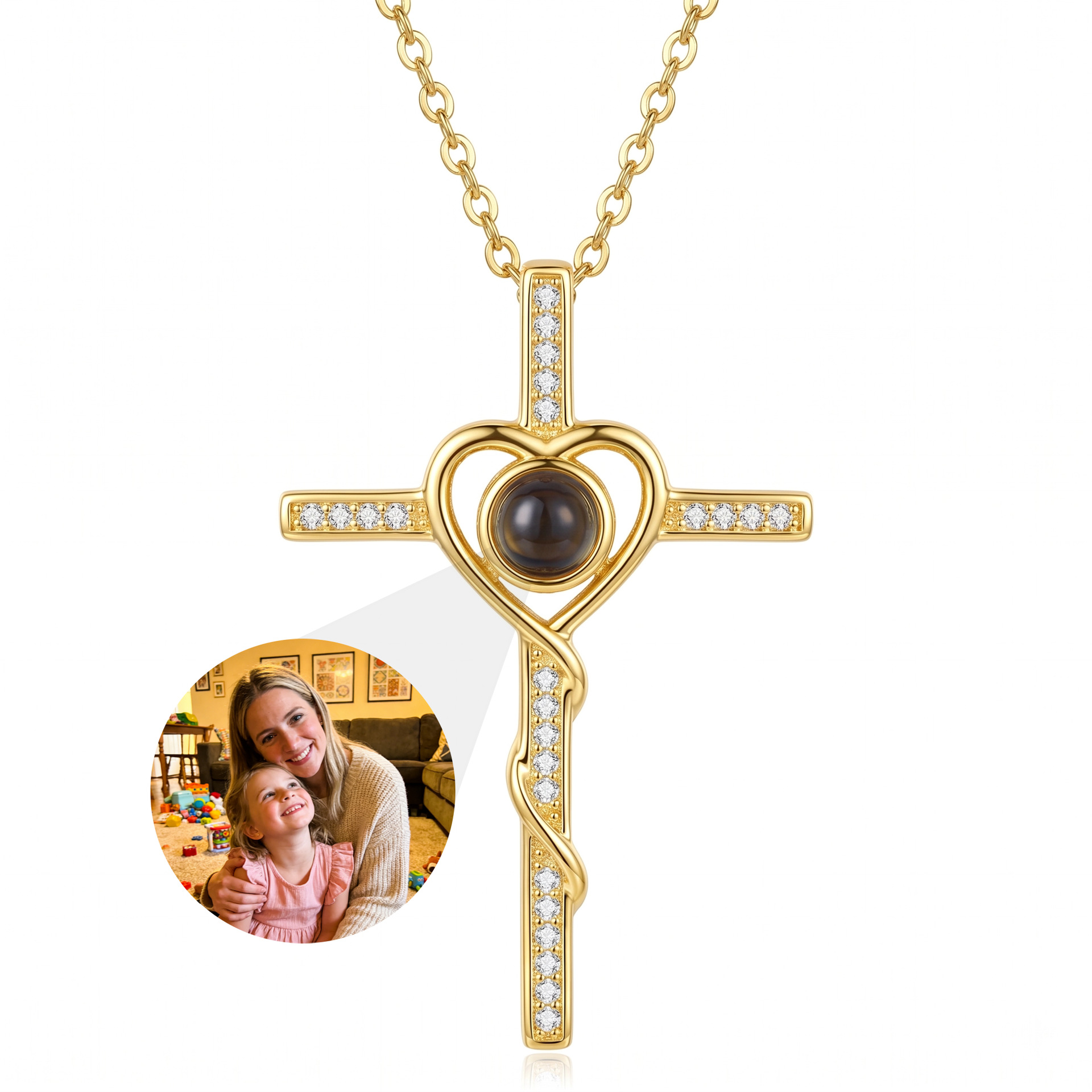 Gold-tone Angel Cross necklace demonstrating a family photograph inside the projection lens